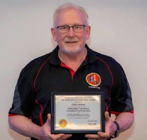 Chris Sieben receiving the Significant Contribution Award (2021)