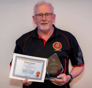 Chris Sieben receiving the Diamond Service Award (2021)
